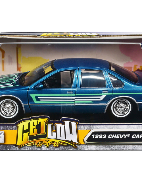 Load image into Gallery viewer, 1993 Chevrolet Caprice Lowrider Blue Metallic with Graphics &quot;Get Low&quot; Series 1/24 Diecast Model Car by Motormax
